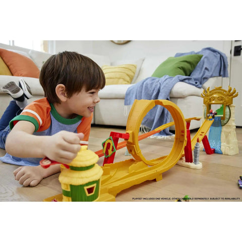 Child playing with Mario Kart Track Set And Die Cast Toy Car Jungle Kingdom Raceway With Waterfall Jump Over 3 Feet Tall.