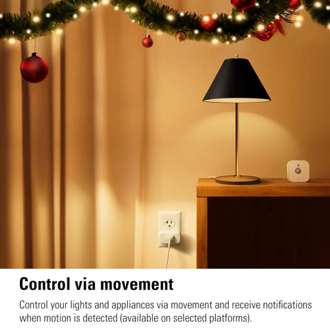 Super Smooth Wireless Smart Motion Sensor 3 Pack Wide Angle Indoor Outdoor Detection No Sweat Setup Works With Apple Home Alexa Google SmartThings Automate Your House Like A Pro Requires Thread Border Router near a table lamp.