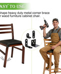 Heavy Duty L Shaped Shelf Brackets Set In Black Stainless Steel 96 Pack installed on a chair with a person holding a drill.