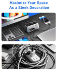 Heavy Duty Desk Power Hub Delivering 100W Fast Usb C Charging With Three Wide Ac Outlets And A Slim Five Foot Flat Cable on a desk with devices.