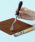 Two Pack Tracing Wheel and Pounce Wheel Set for Paper Perforation and Pattern Making in use on fabric