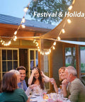 Outdoor String Lights 20Ft With 22 Edison Bulbs E17 Base creating ambiance over a dining area in a garden setting