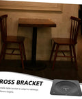 Badass Heavy Duty Table Leg Brackets And Furniture Mounting Plates for Desk Dining Room Upgrades on a table with chairs.