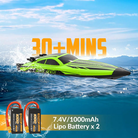 Brushless RC Boat For Adults With Dual Rechargeable Batteries, High Speed Remote Control Boat Reaching 30 Plus MPH On Lakes, 30+ Minutes Of Proportional Control, Green 79705 on water with two visible batteries
