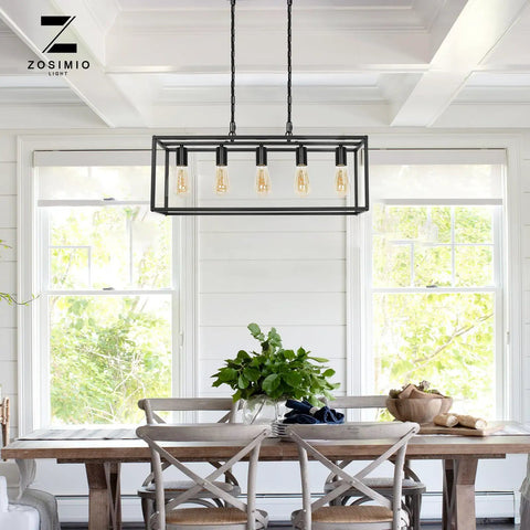 Modern Farmhouse Linear Chandelier In Matte Black For Kitchen Island And Dining Room displayed above a wooden table in a bright room