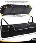 Durable Hanging Trunk Organizer for SUV With Four Pockets Waterproof Backseat Storage Solution Easy Install And Versatile Car Cargo Organizer That Keeps Trunk Neat And ClutterFree, black, with straps and logo, shown from side and top view.