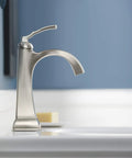 Ridgeport Single Control Lav Faucet with Brushed Nickel Finish in bathroom setting, showing contemporary design and stainless steel construction.