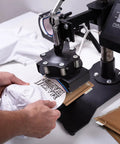 Using Heat Press Pillow Bundle with Five Size Mats Teflon Pillows for Sublimation on a white garment