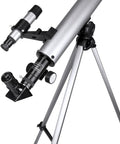 Starwatcher 50mm Refractor Telescope For Beginners With 600mm Focal Length And Coated Optics on a tripod, side view.