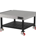 Hella Sturdy Heavy Duty Welding Fixture Table With Precision Laser Cut Industry Standard Holes And Locking Swivel Casters 60X60X36, silver table with shelf and swivel casters.