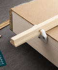 Classic T Shaped Hardwood Center Mount Drawer Slides Four Pack Wooden Cabinet Glides mounted on a cabinet drawer.