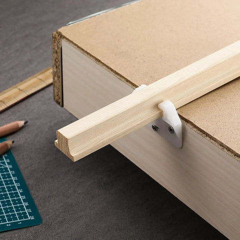 Classic T Shaped Hardwood Center Mount Drawer Slides Four Pack Wooden Cabinet Glides mounted on a cabinet drawer.