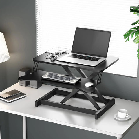 Ergonomic Sit To Stand Desk Converter with dual monitor and laptop setup, height adjustable from 5.1 to 20 inches, black finish.