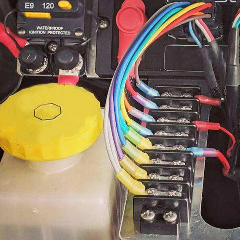 Heavy Duty Double Row Terminal Blocks For 10 To 22 AWG Wiring Stainless Steel Housing 600 Volt 30 Amp Rated Knockout Circuit Connectors with colorful wires.