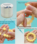 Close-up of clear 0.8 mm Flat Elastic Bead Rope used for making a yellow bead bracelet, showcasing its strength and knotting ease.