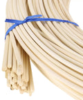 Close-up of Round Reed Spline 350 Ft Roll 0.14 Inch tied with blue string for DIY furniture and basket weaving.