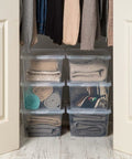 Big Time Seventeen Quart Clear Stackable Storage Bin With Secure Snap Lid For Slick Bedroom Closets Loaded Garages And Wooden Shelving That Gonna Keep Your Setup Tight storing rolled blankets and sweaters in a closet.