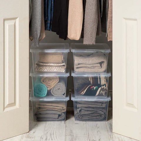 Big Time Seventeen Quart Clear Stackable Storage Bin With Secure Snap Lid For Slick Bedroom Closets Loaded Garages And Wooden Shelving That Gonna Keep Your Setup Tight storing rolled blankets and sweaters in a closet.