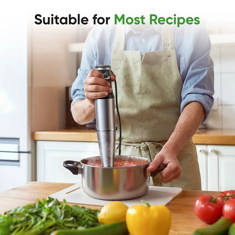 Man using Powerful 1100W Immersion Hand Blender 3 In 1 Corded Stick With Trigger Speed Control Includes Whisk And Milk Frother Attachments The Ultimate Emulsifier For Soups Smoothies Purees And Sauces in kitchen
