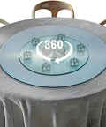 Large Round Clear Tempered Glass Lazy Susan Turntable Heavy Duty Swivel Rotating Serving Tray on a table with 360-degree spin feature.