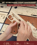 Hands assembling 3D Wooden Puzzle Kit For Adults 275 Pieces Submachine Shooter With Rubber Band Firing model, laser-cut pieces.