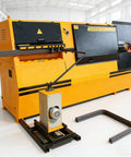 Heavy Duty Cnc Rebar Stirrup Bender, Pro Grade Electric Steel Bending Machine with rebar on a worksite.
