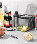 Stainless Steel Angled Measuring Jigger For Easy Reading From Above With Dual Ounce And Tablespoon Markings in kitchen setting.