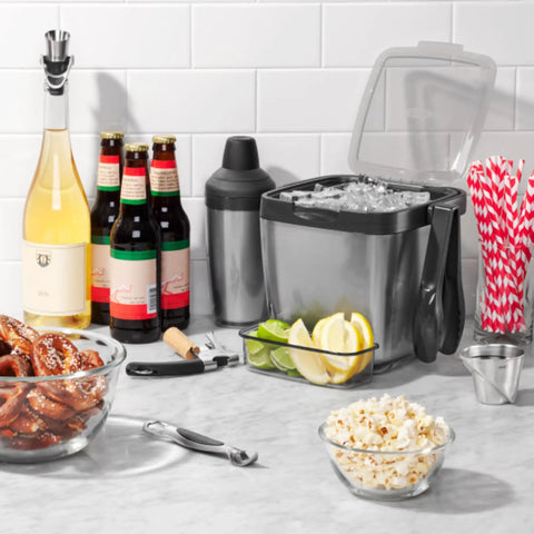 Stainless Steel Angled Measuring Jigger For Easy Reading From Above With Dual Ounce And Tablespoon Markings in kitchen setting.