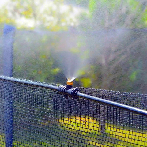 Brass Misting Nozzle Replacement Heads 0.2mm Orifice 10/24 UNC Outdoor Cooling System on net emitting fine mist.