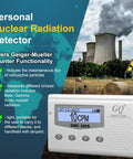 Front view of white GQ GMC-300S Geiger counter with LCD display showing 10 CPM.