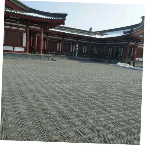 Traditional courtyard paved with patterned tiles similar to 14.5 Inch Square Cement Paver Mold for Concrete Stepping Stones.