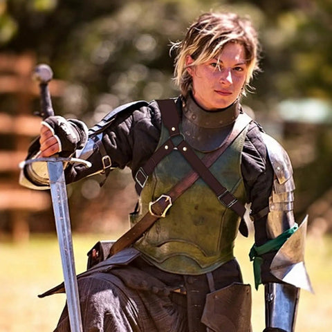 Person in armor with Old School Medieval Leather Back Sword Frog Holster For Renaissance Viking Warrior Costumes, sword in hand.