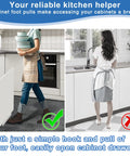 Hands Free Cabinet Foot Pull For Trash Drawer, person opening cabinet with foot in kitchen, stainless steel opener for overlay cabinets