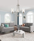 Dope 3 Light Modern Chandelier In Brushed Nickel With Clear Glass Shades hanging in contemporary living room