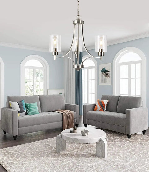 Dope 3 Light Modern Chandelier In Brushed Nickel With Clear Glass Shades hanging in contemporary living room