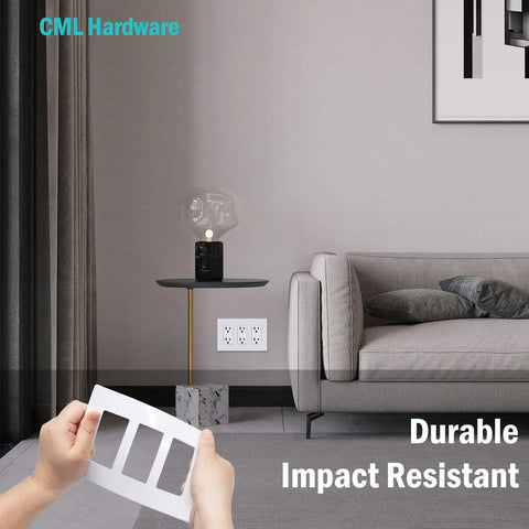 Person holding 3 Gang Screwless Decorator Wall Plates 2 Pack Slick Flush Mount Light Switch Covers with hidden screws, living room scene