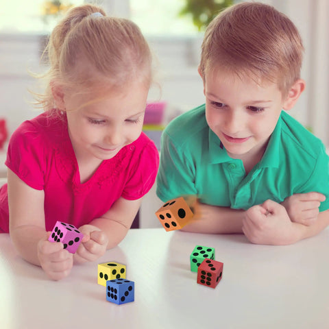 Children playing with Colorful Foam Dice Set Pack Of 24 Large 1.5 Inch Cubes In Six Bright Colors For Kid Friendly Math Games
