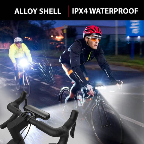Cyclists using Lit Ultra Bright 2600 Lumen Bike Light Set For Night Riding Front And Rear USB C Rechargeable LED light at night.