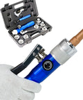 AMZCNC hydraulic tube expander kit with 7 expander heads and cutter in blue case; gloved hand on copper pipe.