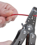 Close-up of hand using 13-In-1 Electrician Multi-Tool For Wiring Projects With Wire Strippers, Long Nose Pliers, And Cutters, cutting wire.