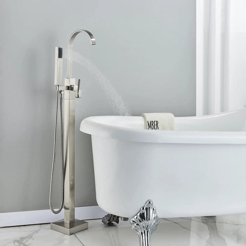 Pro Grade Floor Mount Tub Filler Freestanding Bathtub Faucet With Brushed Nickel Finish next to a white clawfoot tub