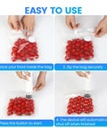 Visible Tank Handheld Food Vacuum Sealer With One Touch Strong Suction, Portable Wireless Sealing Device in use on cherry tomatoes