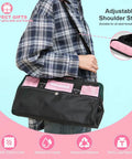 Person holding pink 269 Piece All-In-One Home Tool Set with adjustable strap and durable storage bag for DIY projects.