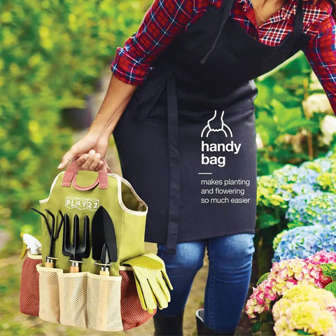 Gardener holding 10 Piece Garden Tools Set With Heavy Duty Hand Tools And Fashion Tote Bag For Women Ergonomic Handles Includes Weeder Transplanter Trowel Pruner Rake Fork Gloves And Spray Bottle Durable Garden Kit Gift For Her