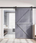 Gray Wood Barn Door Slab 48 By 84 Inches With 8 Foot Barn Door Hardware Track Kit Included in a modern interior setting.