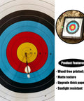 Close-up of arrow hitting 50 Piece Archery Target Papers Set with 8 Plastic Target Face Pins and Marker Pen for backyard practice.