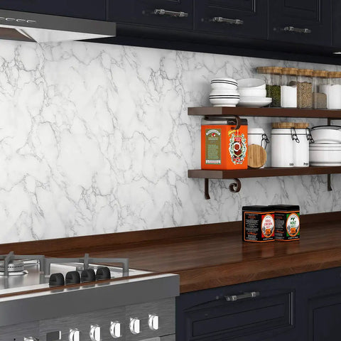 Ultra Wide 36 By 197 White Marble Peel And Stick Countertop Wallpaper in kitchen with dark cabinets and wooden shelves.