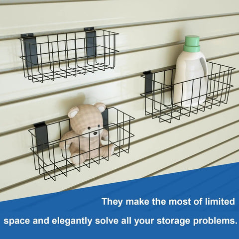 Ultimate Slatwall Storage Kit For Garage And Shop Organization with 3 wire baskets mounted on a slat wall holding items