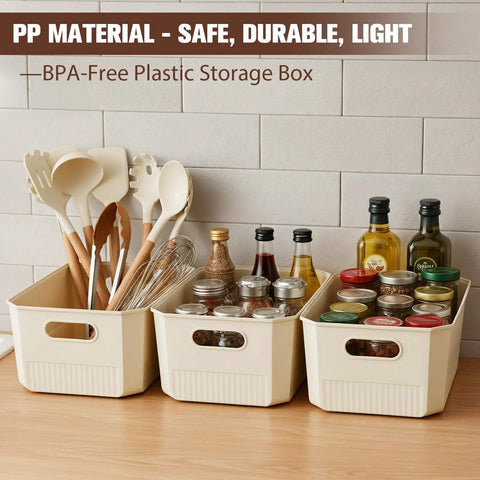 Three beige BPA-free PP storage boxes on a countertop, filled with kitchen utensils, jars, and bottles.