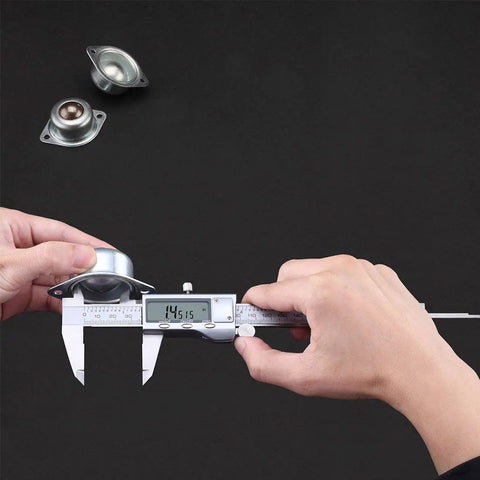 Hands using 6 Inch Digital Caliper With Stainless Steel Polished Finish, Inch Millimeter And Fraction Readouts on metal part